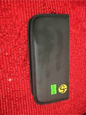 Compact Black Heat-Tool Travel Case with Yellow Logo
